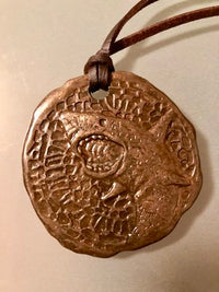 Symbol of Sekulah, the Shark God